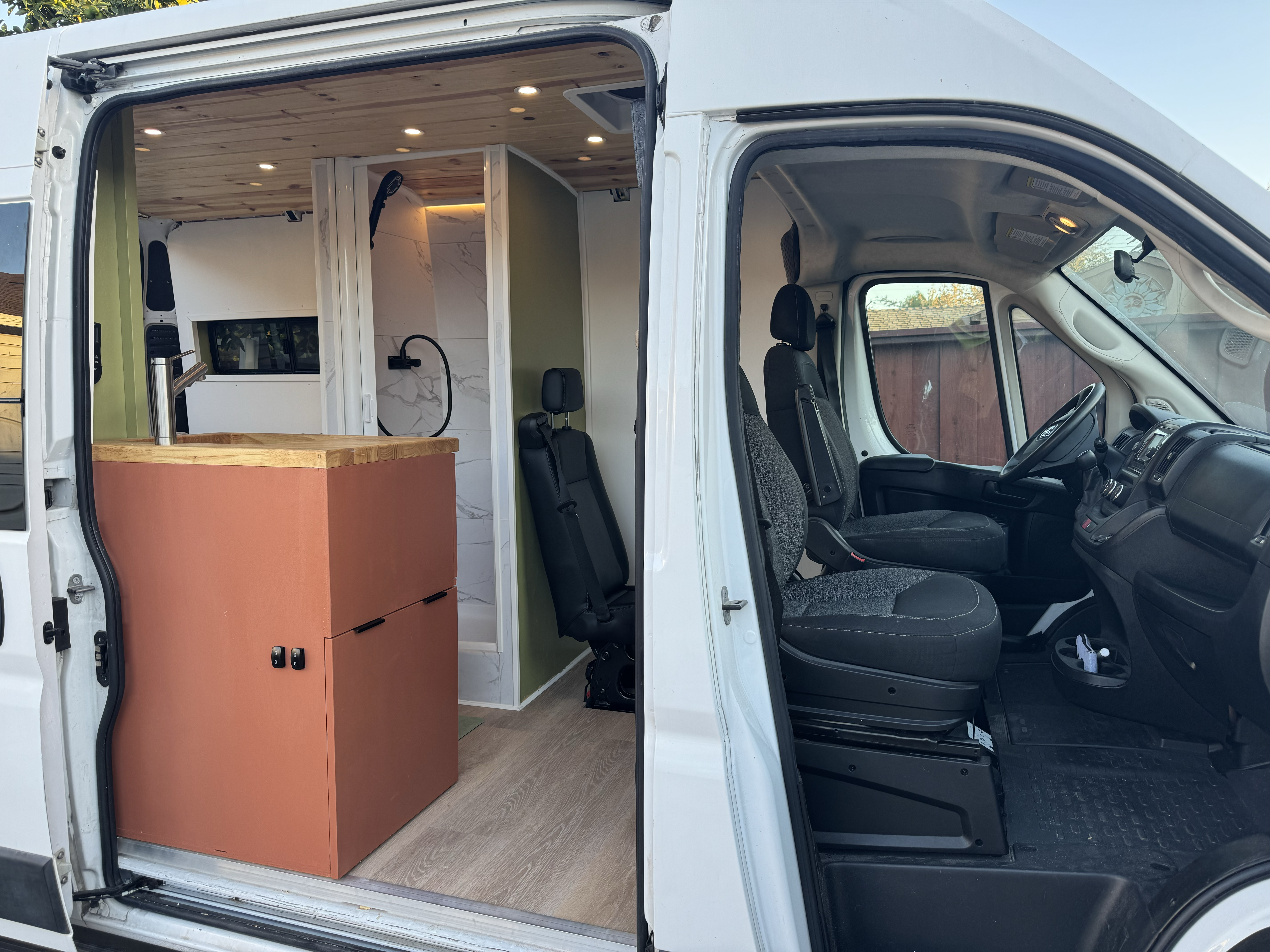 Front view of the interior showing sink and shower