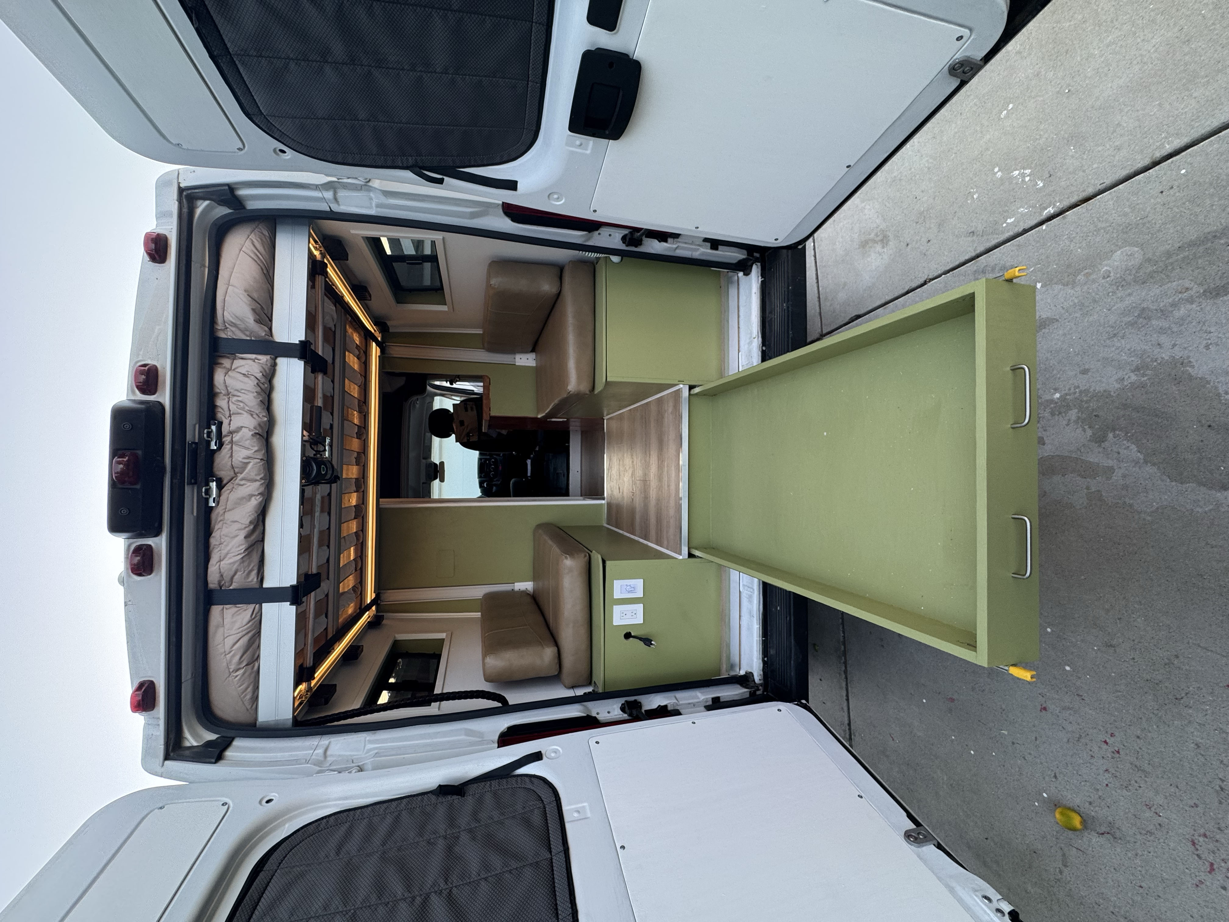 Rear view with elevated bed and seating area